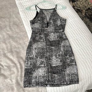 Spectacular black and silver dress with mesh insert - way to sparkle!